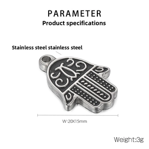 Detail view of a 20x15mm stainless steel Hamsa hand pendant with retro engraving