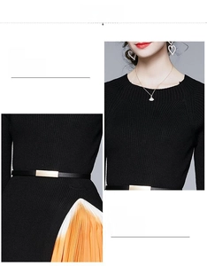 Détail de la taille d'une robe en maille avec ceinture et ourlet plissé orange
