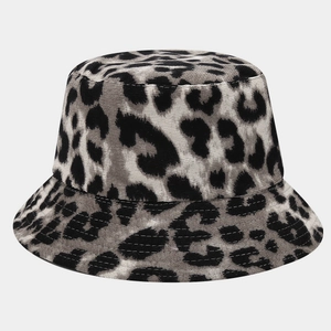 Detailed close-up of grey and black leopard print corduroy texture on bucket hat