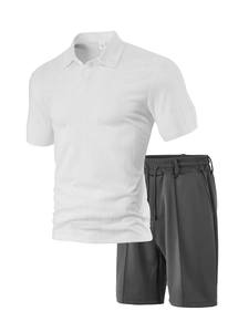 Detail of white waffle texture polo shirt and dark grey shorts men's athletic set