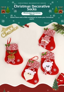 Detail of four Christmas stockings with 3D Santa, Reindeer, Snowman and Bear patterns