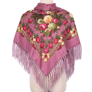 Detail of pink floral square scarf with elegant roses and long matching fringe