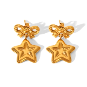 Golden bowknot earrings with star pendants in stainless steel for women on white background