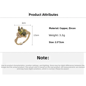 Detail view of gold-plated ring with marquise green zircon, 3.3g weight, size 2.5x2cm