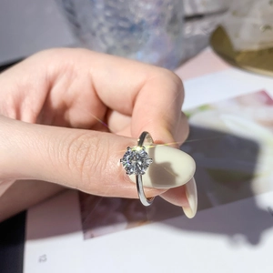 Classic minimalist silver ring featuring a large round zircon stone in a six-prong setting