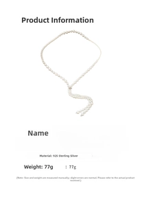 Detail view of long tassel necklace with faux pearls and rhinestones measuring 108.9cm