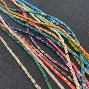 Macro view of colorful square imperial stone beads in various vibrant colors for DIY jewelry
