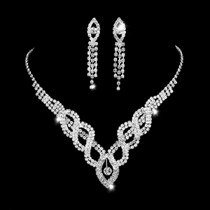Sparkling silver bridal jewelry set with V-shaped rhinestone necklace and drop earrings
