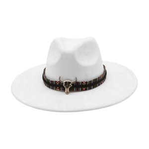 Detailed view of a white wide-brimmed fedora with a bull head metal ornament and band