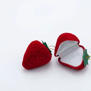 Red strawberry flocking jewelry box for rings and earrings with green leaf lid