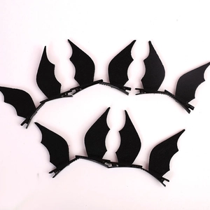 Cute black bat wing hair clips for Halloween cosplay accessories on white background