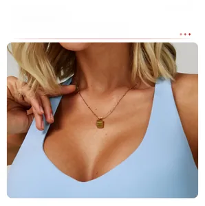Detailed view of light blue V-neck sports bra with comfortable seamless texture