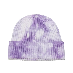 Detailed view of the vertical rib knit texture and purple tie-dye pattern on the beanie
