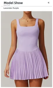 Front detail of lavender tennis dress featuring wide shoulder straps and pleated hemline