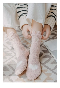 Pink coral fleece socks with cat ears and white heart pattern for cozy winter wear