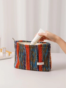 Bohemian striped knitted makeup bag with metal zipper and spacious travel storage