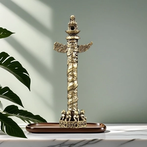 Macro detail of antique brass Huabiao pillar with intricate dragon carving on wood tray