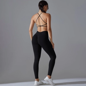 Detail of seamless yoga set with a cross-back sports bra and high-waist compression leggings