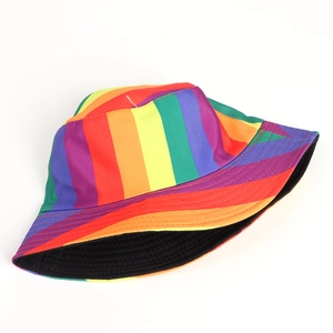 Detail view of the colorful rainbow stripes and fine stitching on the reversible sun hat