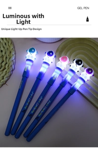 Close-up of LED glowing astronaut gel pens with various colorful detailing on a tray