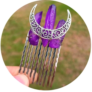 Natural purple crystal hair comb with silver moon moon crescent on outdoor background