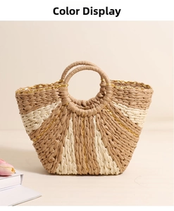Detailed close-up of woven straw handbag featuring gold metallic threads and circular handle