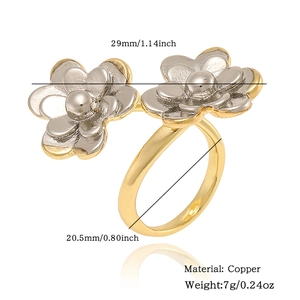 Detail view of two-tone flower ring in copper with measurements 29mm width and 7g weight