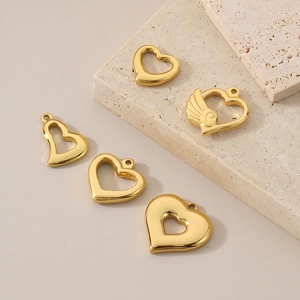 Polished golden stainless steel heart pendants including a unique winged design