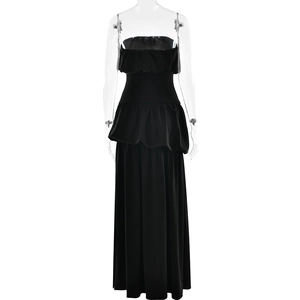 Detailed view of black strapless maxi dress with tiered ruffle waist and side slit design