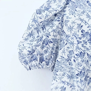 French style floral dress with elegant puff sleeves and blue botanical prints
