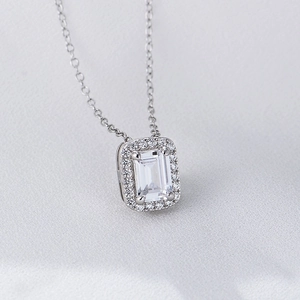 Elegant sterling silver necklace featuring a square emerald-cut zircon with halo setting
