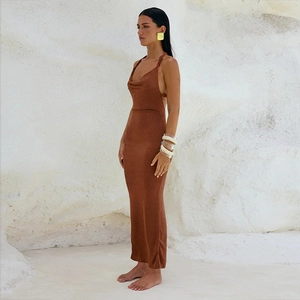 Detail view of brown backless halter maxi dress with slim fit and smooth finish
