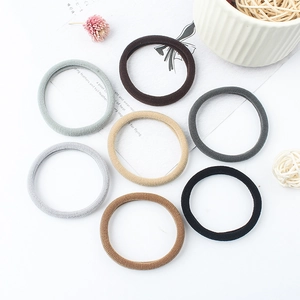 Set of 7 minimalist flocked elastic hair ties in neutral solid colors for women and girls