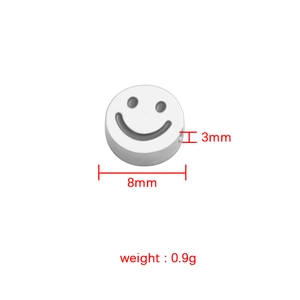 Detailed view of silver smiley face charm bead with 8mm diameter and 3mm thickness