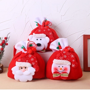 Detail view of festive Christmas drawstring gift bags with Santa, bear and snowman designs