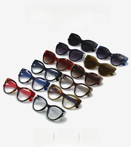 Detail of trendy cat-eye sunglasses collection with various colors and durable frames
