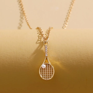 Minimalist gold tennis racket necklace with white pearl and sparkling zircon pendant