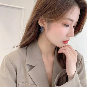 Cute blue stitch-style cartoon fox earrings for women in creative silver stud design
