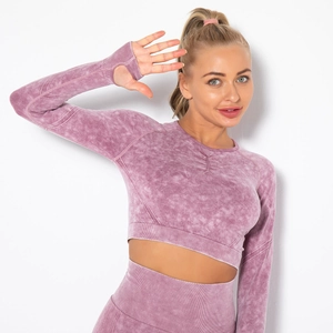 Detail view of purple acid wash yoga set featuring thumb holes and ribbed seamless fabric