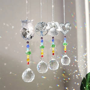Set of 4 crystal suncatchers with owl, tree of life, angel, and heart metal charms