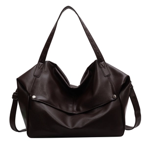 Large dark brown faux leather tote bag with lychee texture and silver metal buckles