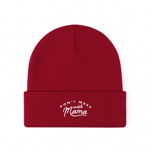 Dark red knit beanie with white Don't Mess With Mama embroidery on the cuff
