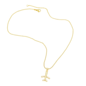 Detail of a gold plane pendant with sparkling zircon stones on a stylish ball chain