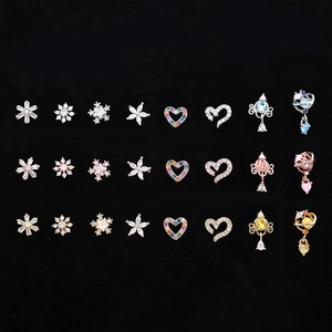 Detailed macro view of multi-colored zircon heart and star piercing studs set