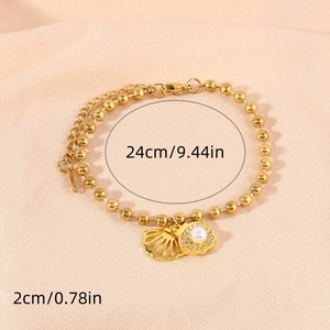 Gold hollow shell and pearl pendant bracelet with adjustable beaded chain and lobster clasp