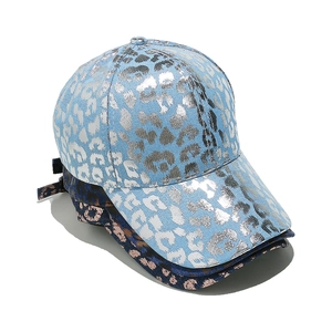 Three leopard print baseball caps with foil metallic finish in blue, navy and pink colors