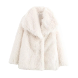 Close-up of high-quality white faux fur coat showing soft plush texture and material