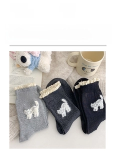 Detail of cute cotton crew socks featuring lace trim and cat embroidery in three colors