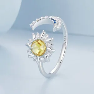 Sparkling S925 sterling silver open ring featuring sun and moon symbols with crystals