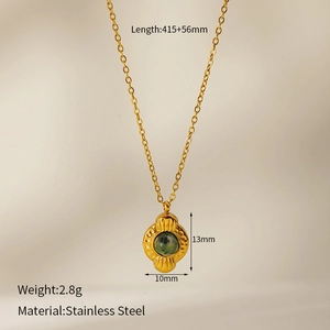 Detail shot of vintage gold-plated stainless steel necklace showing dimensions and weight